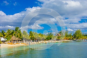 CANCUN, MEXICO - JANUARY 10, 2018: Unidentified people swimming in a beautiful caribbean beach isla mujeres in Mexico