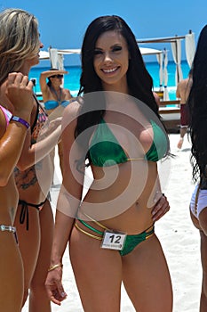 CANCUN, MEXICO - MAY 03: Models pose outside during semi-finals rehearsal IBMS 2014