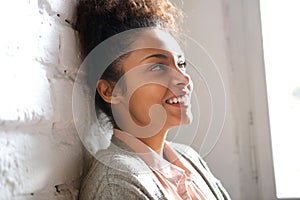 Candid portrait of a smiling young woman photo