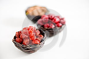 Candied fruits and dried berries and fruits in baskets. Oriental sweets.