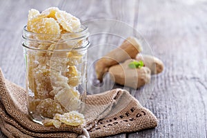 Candied ginger in a jar photo