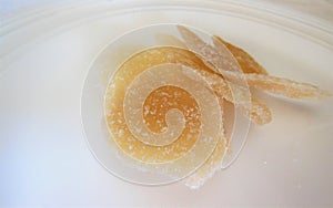 Candied ginger on a white plate