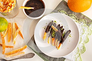 Candied orange peel in chocolate or sugar is a favorite Christmas treat for children and adults