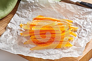 Candied orange peels on wrinkled baking paper