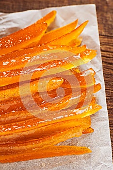Candied orange peels on wrinkled baking paper