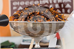 Candied Orange Rind covered with Dark Chocolate on Silver-plated Bowl