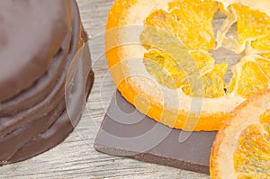 Candied orange slices covered with chocolate photo