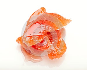 Candied segment of quince in jam