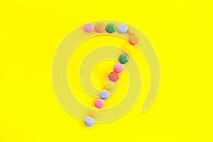 Candies font. Number 7 - seven - on yellow background top view