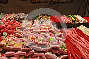 Candies of various colors and flavors in a street stall photo