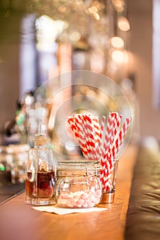 Candies on wooden barroom