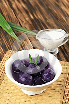 Candil Ubi Ungu or Purple Sweet Potato Balls with Palm Sugar and Coconut Milk Sauce