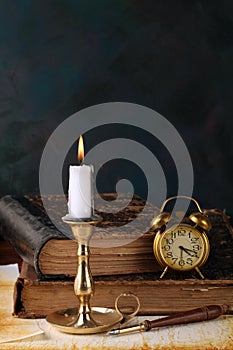 Candle with books