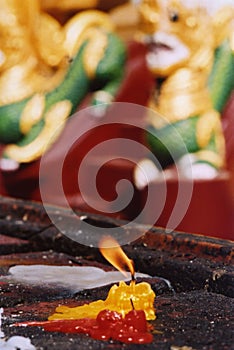 Candle burning in a pagoda