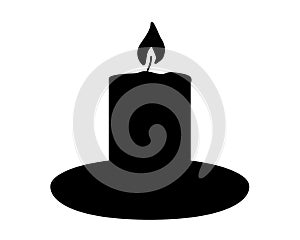 Candle in candlestick - black vector silhouette for pictogram or logo. A candle on a saucer is a sign or icon.