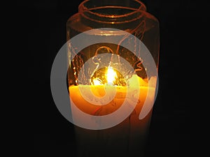 Candle decorated with angel pattern