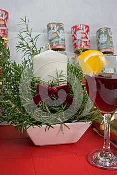 Candle display in a ceramic pot + fern for Christmas