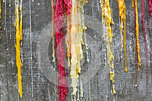 Candle drippings on Old brick wall background