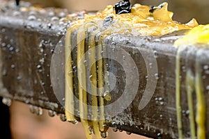 Candle drippings and water drop on steel