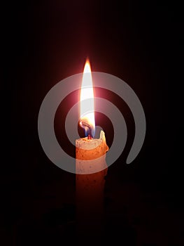Candle fire in dark background