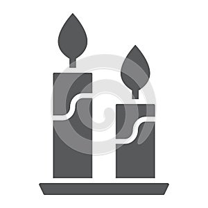 Candle glyph icon, flame and spirituality, fire sign, vector graphics, a solid pattern on a white background.