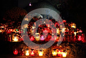 Candle on the grave of Warsaw Uprising soldiers