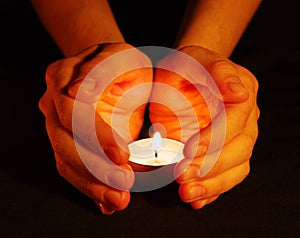 Candle in a hand