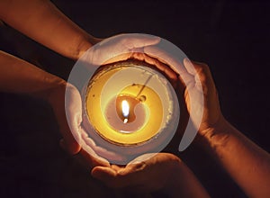 Candle in the hands