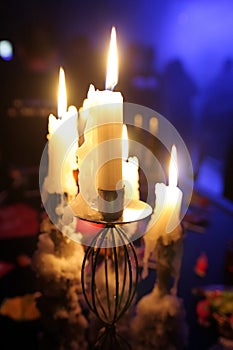 Candle-holder in a disco