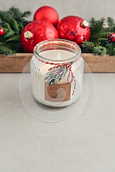 Candle in jar with christmas decorations