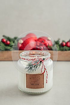 Candle in jar with christmas decorations