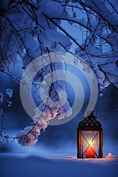 Candle lantern in the snow