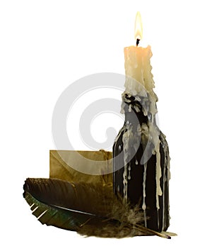 Candle with letter and feather photo