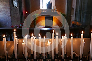 candle light in romanesque church