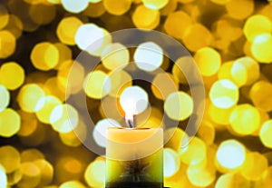 The candle light in yellow bokeh background
