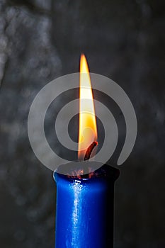 Candle Macro Closeup. Candle flame on dark background