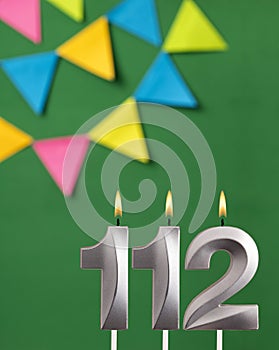 Candle number 112 birthday - Green anniversary card with pennants