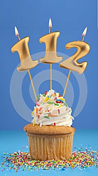 Candle number 112 - Cake birthday in blue background