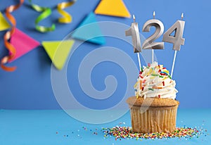 Candle number 124 - Cake birthday in blue background