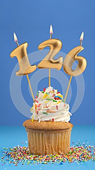 Candle number 126 - Cake birthday in blue background