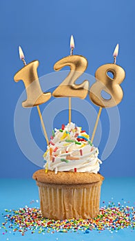 Candle number 128 - Cupcake birthday in blue background