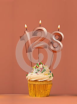 Candle number 128 - Cupcake birthday in coral fusion background