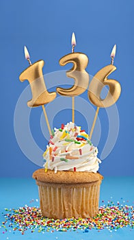 Candle number 136 - Cupcake birthday in blue background