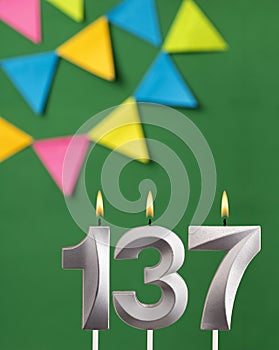 Candle number 137 birthday - Green anniversary card with pennants