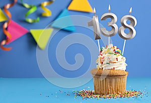 Candle number 138 - Cupcake birthday in blue background