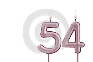 Candle number 54 - Lit birthday candle on white background