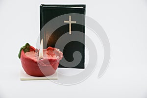 Candle and prayer book