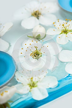 Candle with spring flowers