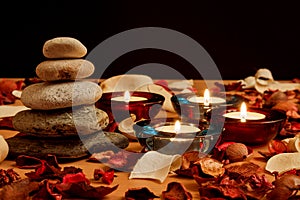 Candle and stones,