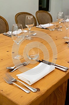 Candlelit dinner setting on a hotel table.